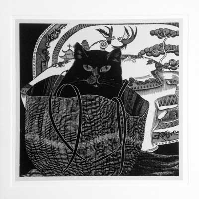 Black cat sitting inside a woven basket in front of a decorative Asian-style backdrop.