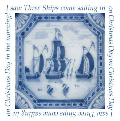 Blue and white tile depicting three sailing ships in water, bordered by text of a Christmas song lyric.