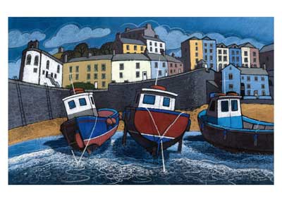 Colorful houses on a hill behind three boats docked on dark blue water at a harbor.
