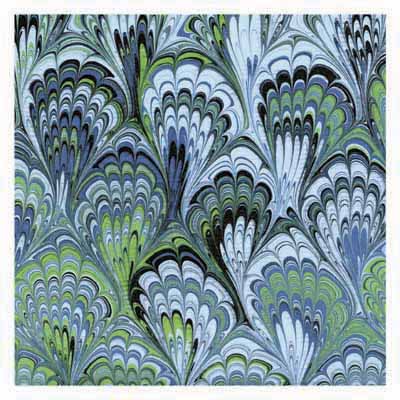 Blue, green, and black marbled pattern with fan-shaped, swirling designs.