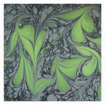 Abstract marbled pattern with swirling green, black, and gray shapes.