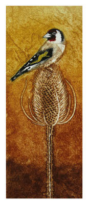 A small bird with black, white, yellow, and red perched on a tall textured brown plant on a golden background.