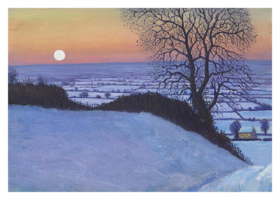 Snow-covered hill with bare tree at sunset and a glowing full moon in the sky.